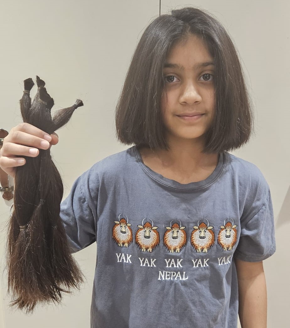 Mehar raised £1,100 from her sponsored haircut. 