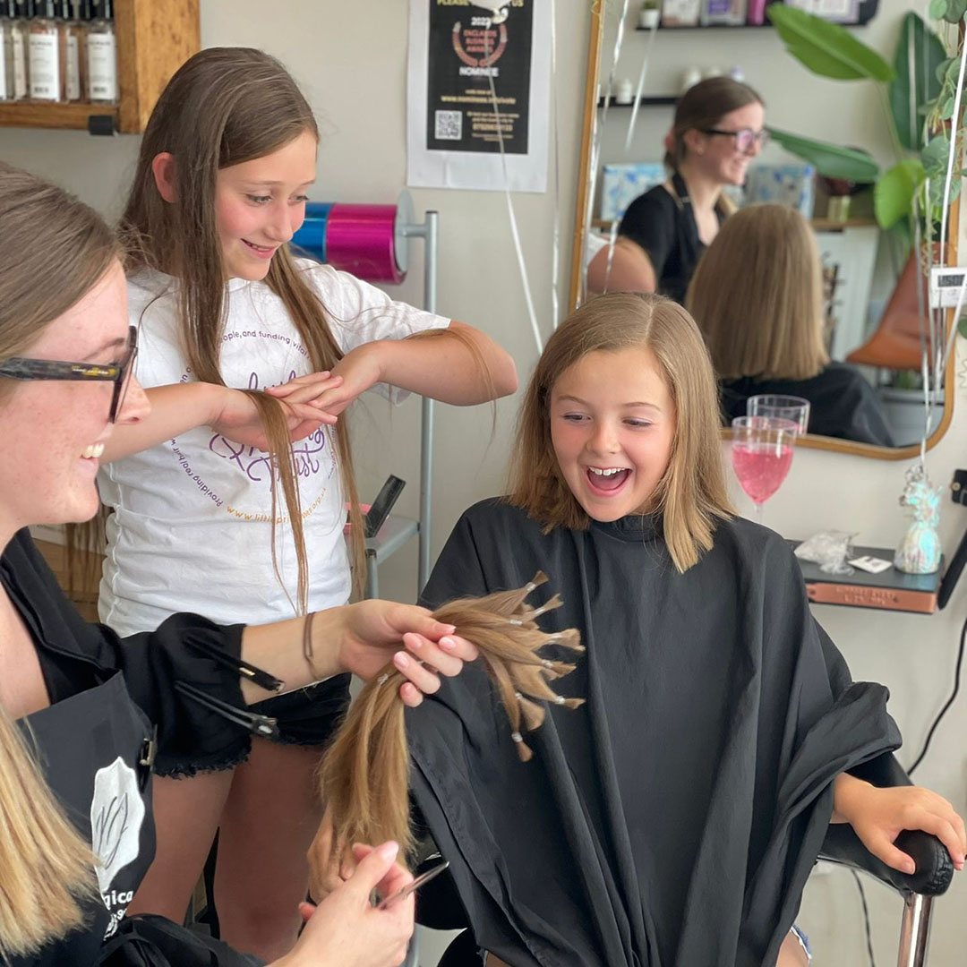 Best friends Tia and Hattie donate hair together!