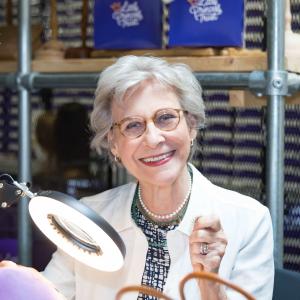 Duchess of Gloucester tries wig-knotting at The Little Princess Trust