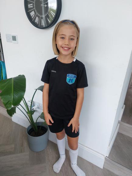Paisley in her football kit, sporting her new look!