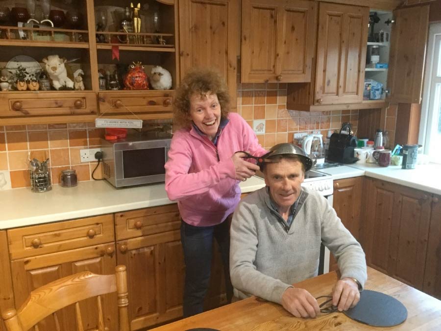 Horse trainer Lucinda Russell finds inspiration in the kitchen cupboards to guide her scissors whilst cutting partner Peter Scudamore's hair!