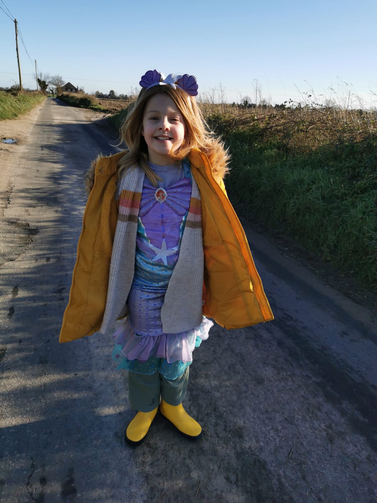 Isla George wearing her wig from The Little Princess Trust.