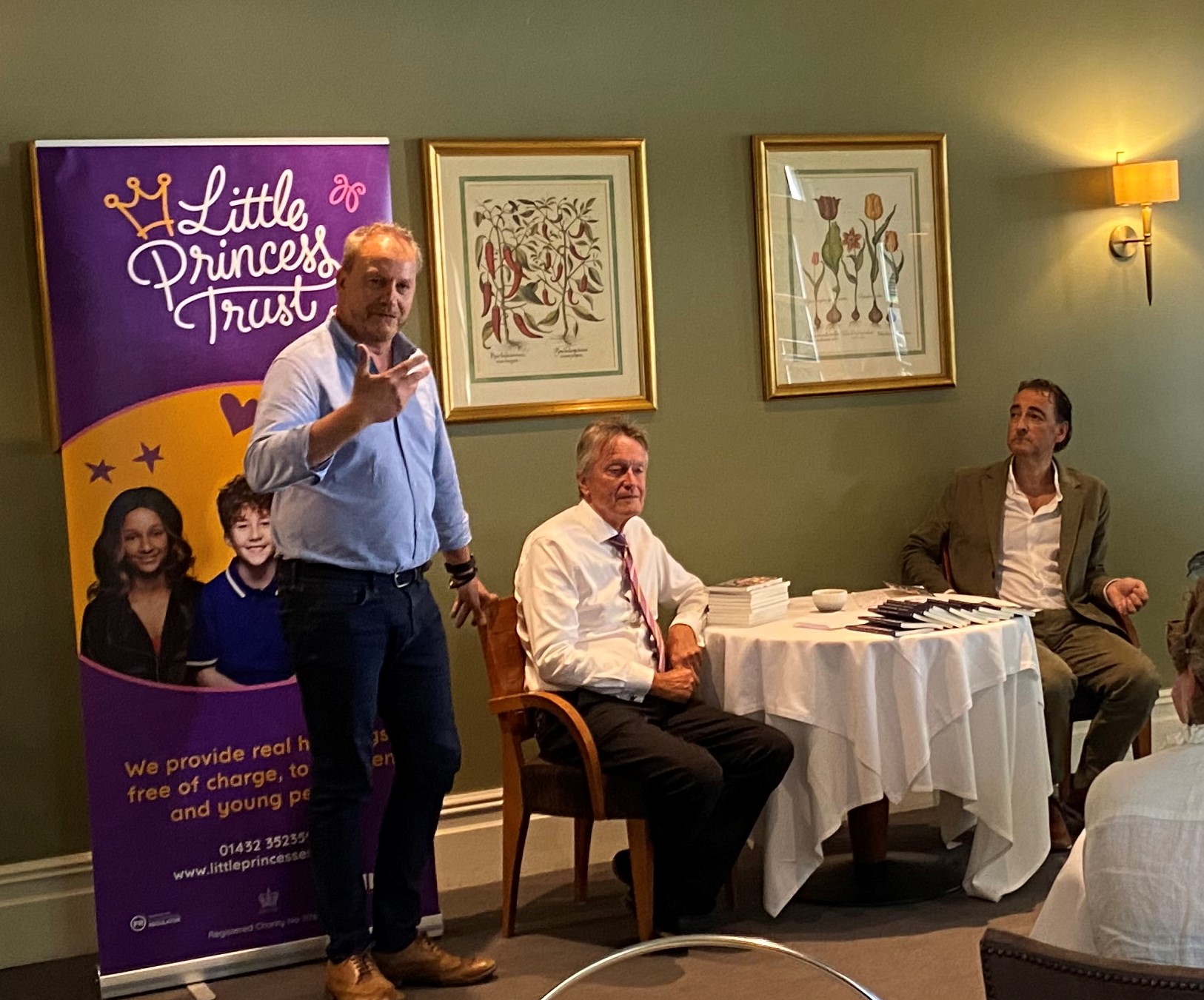 Phil Brace, from The Little Princess Trust, thanks Alistair McGowan for giving up his time to help the charity.