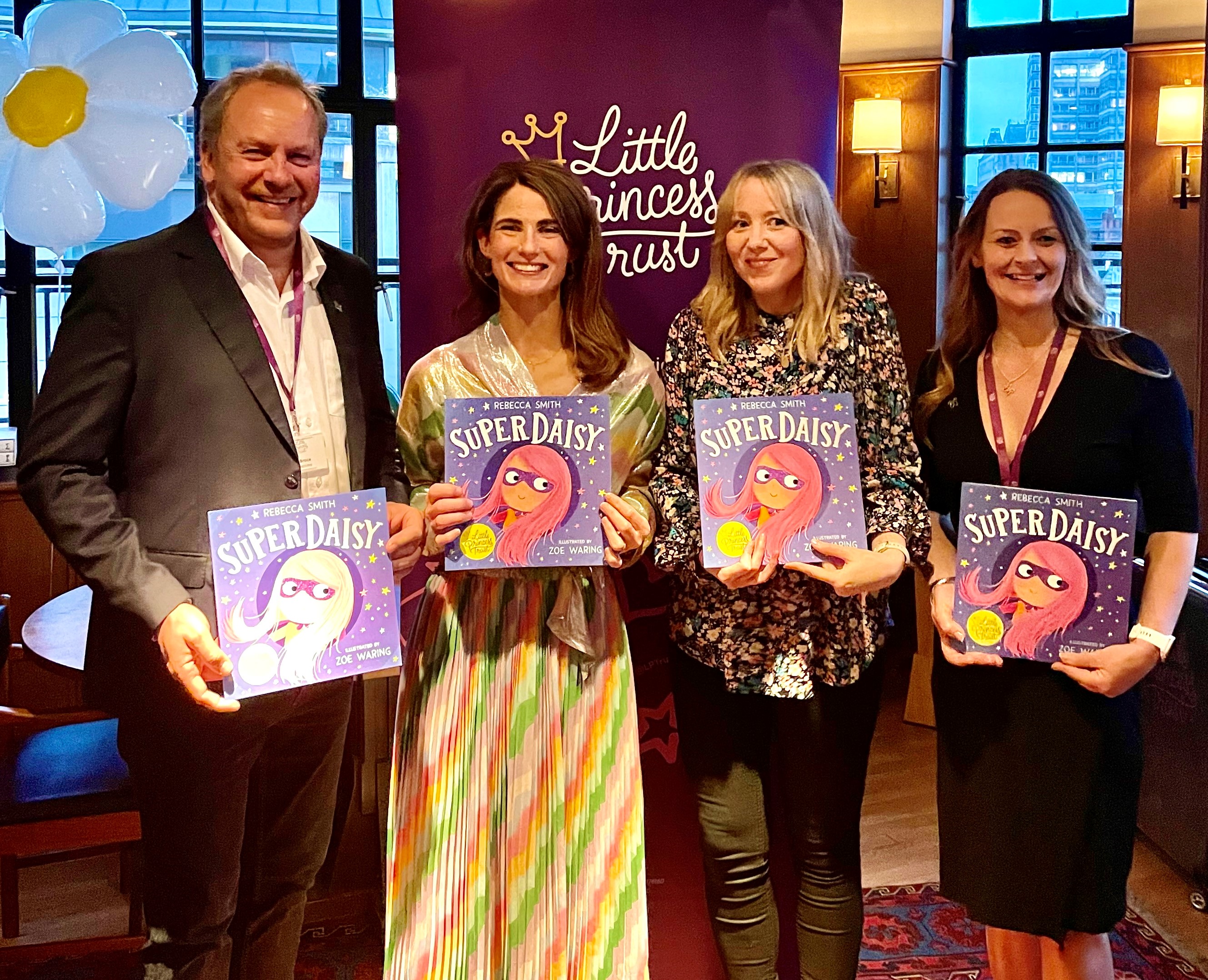 Phil Brace and Wendy Tarplee-Morris (right), from LPT, with author Rebecca Smith (second left) and illustrator Zoe Waring at the official launch of SuperDaisy.