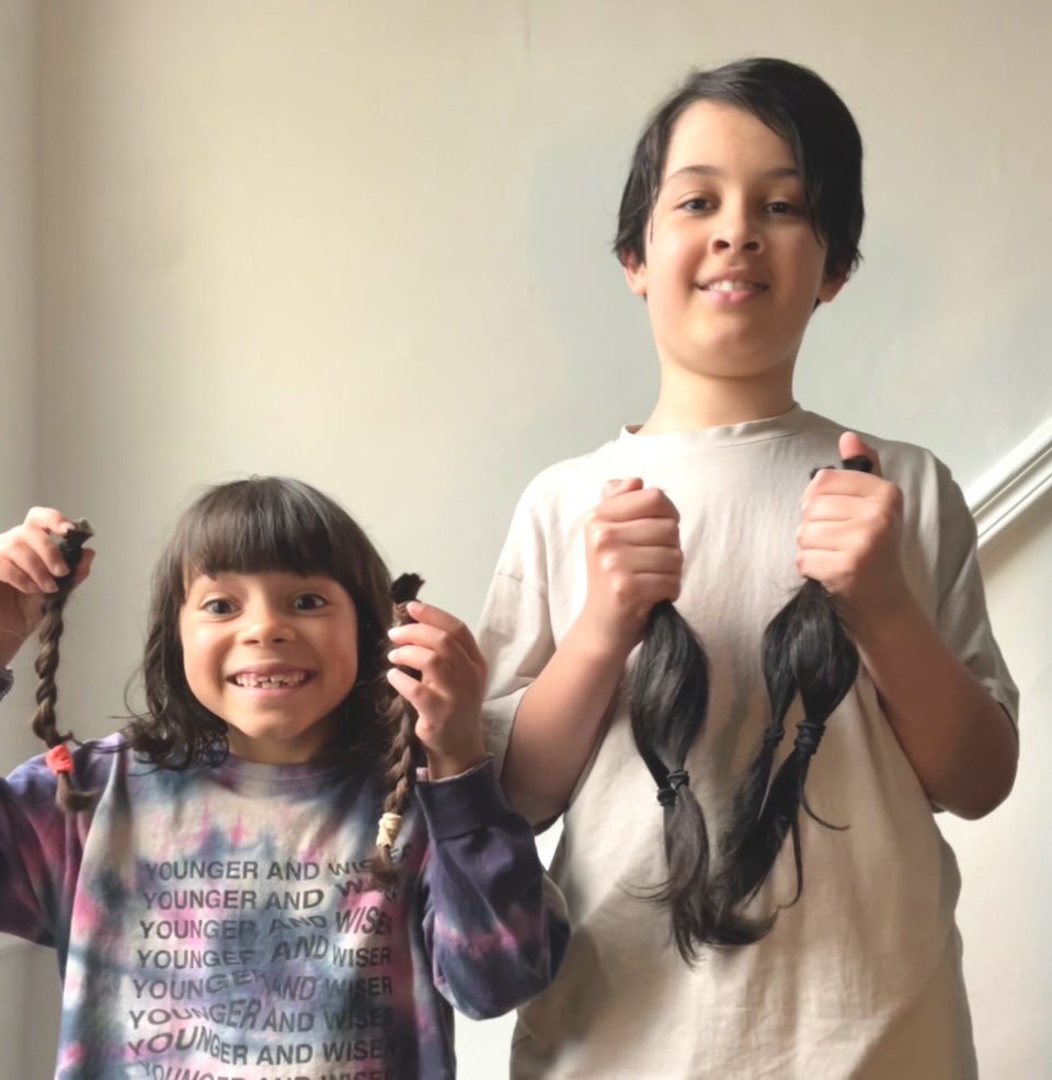 The cousins after their sponsored hair cuts.