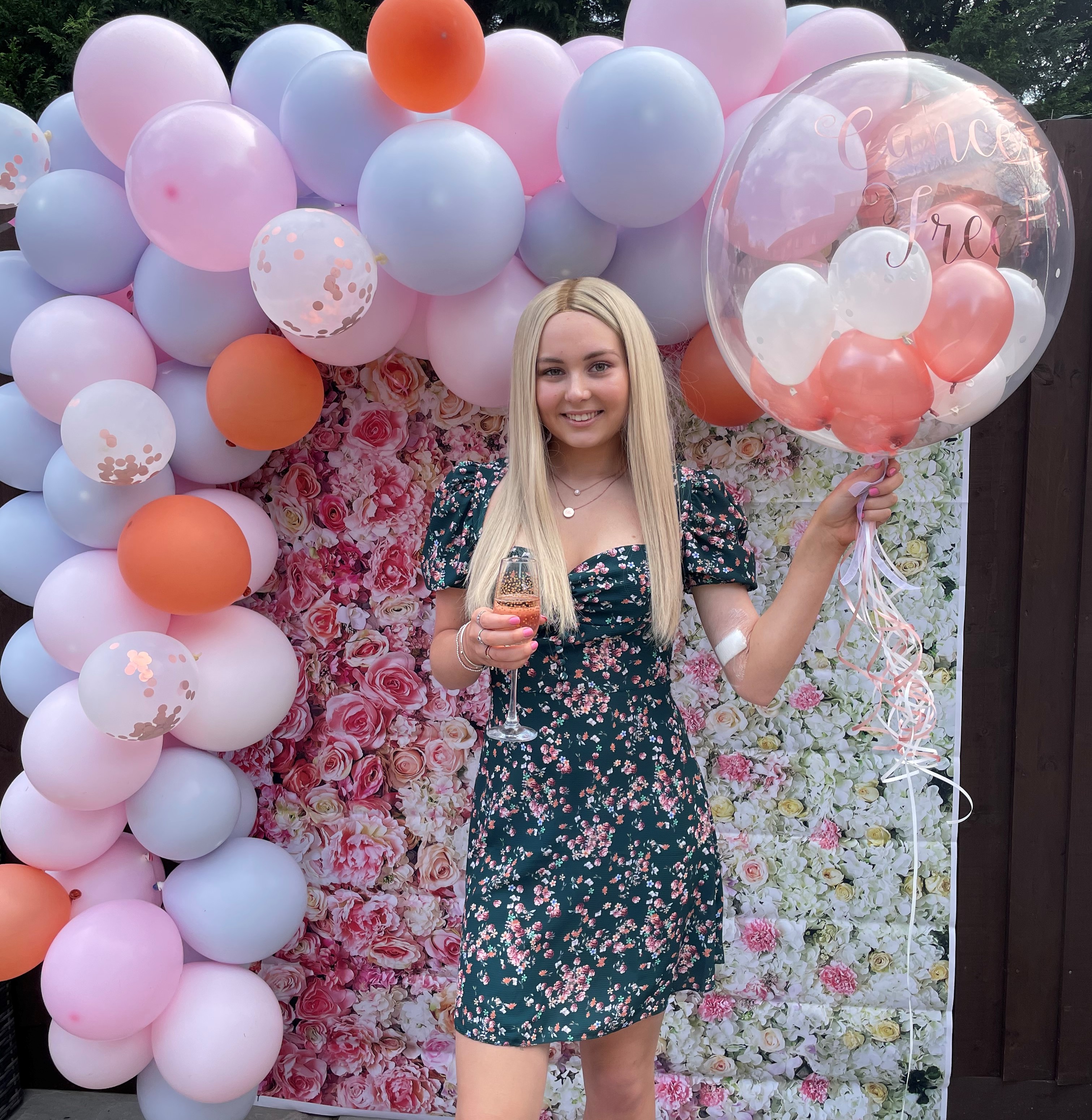 Ellie Bray pictured wearing the first wig she received from LPT when she went into remission.