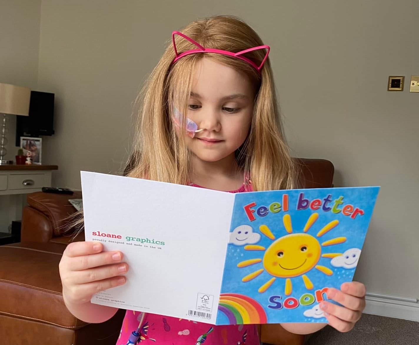 Emilia wearing her wig from The Little Princess Trust.