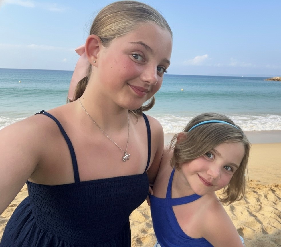 Ellie (left) with her younger sister Emilia.
