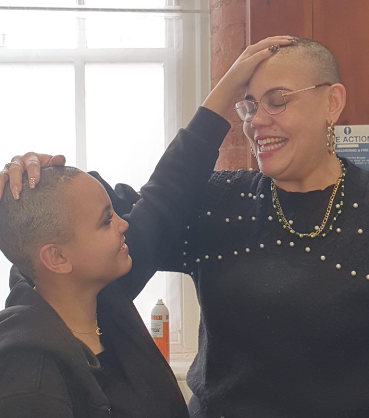 Jahzara, left, and her sister Ayesha shortly after their hair cuts at TrendCo in Manchester.