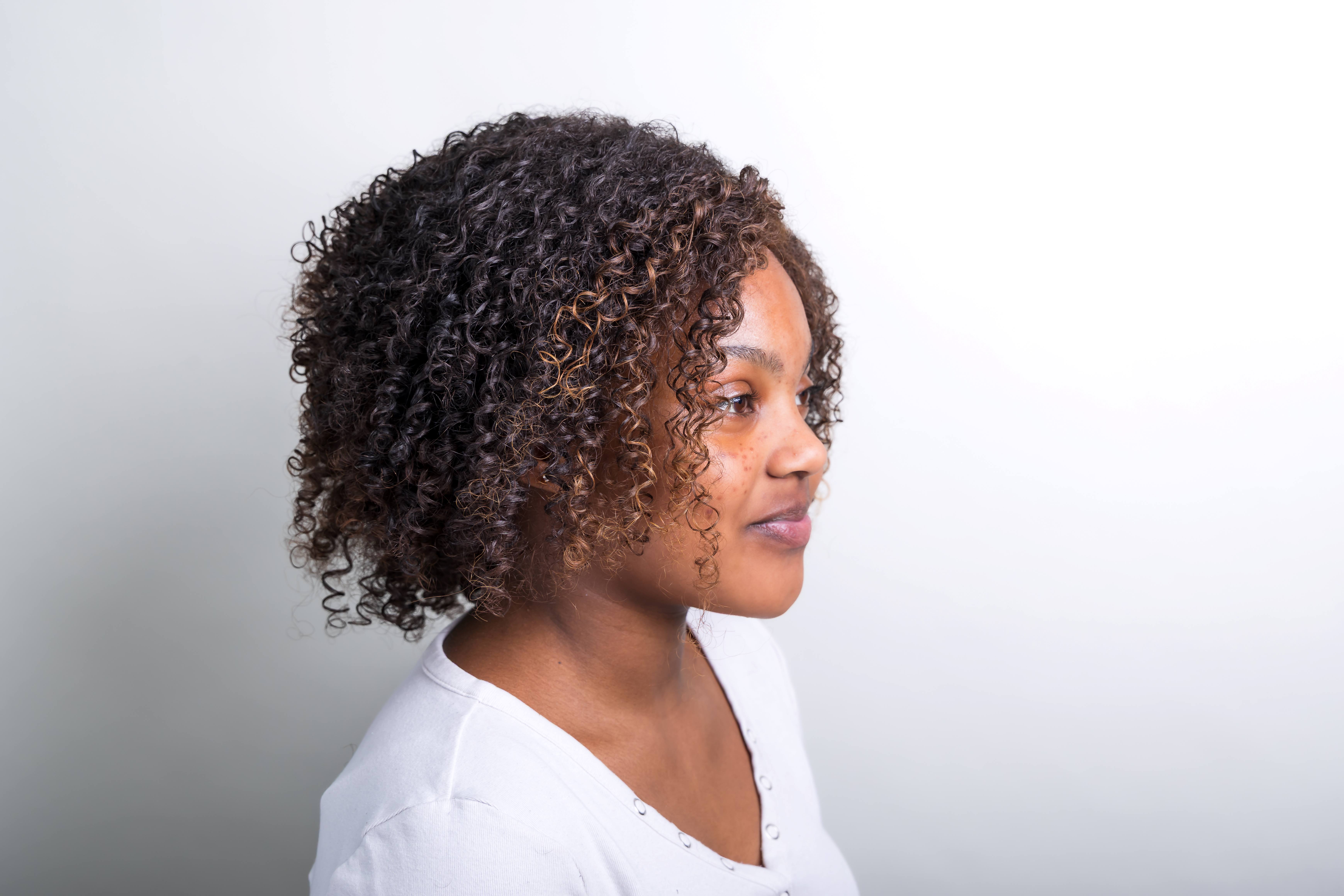 A model wears a Little Princess Trust wig at Raoul Wigmakers in London. Photo: Gabriella Karney.