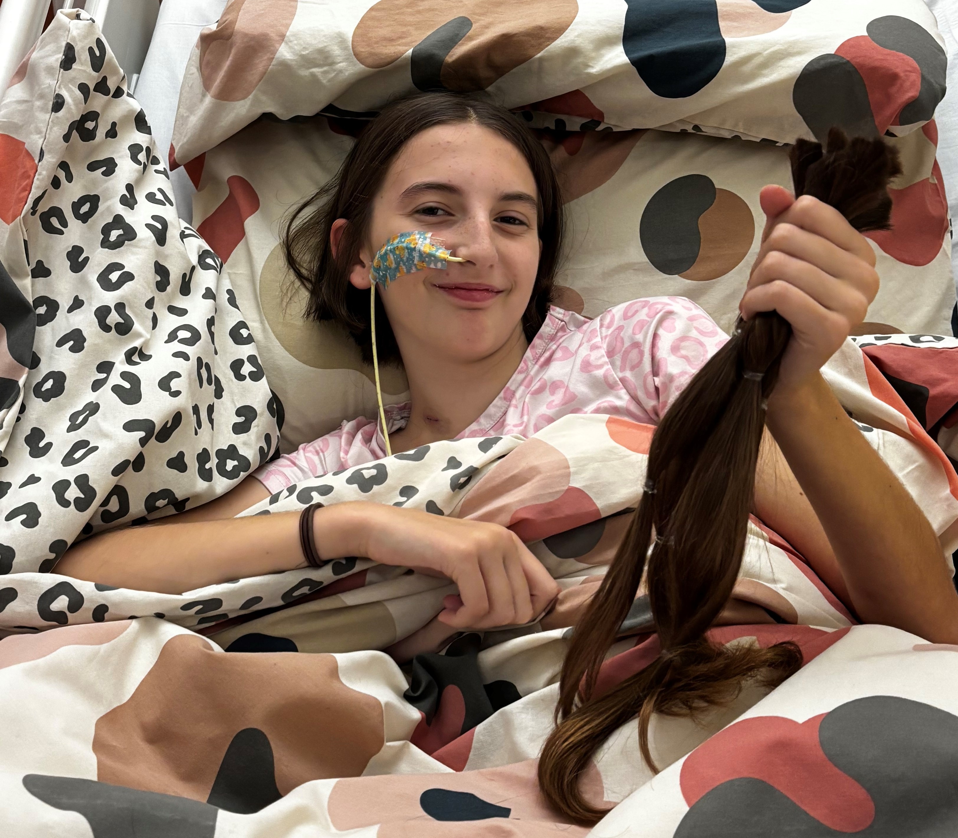 Lola donated 15 inches of her hair as she underwent cancer treatment.