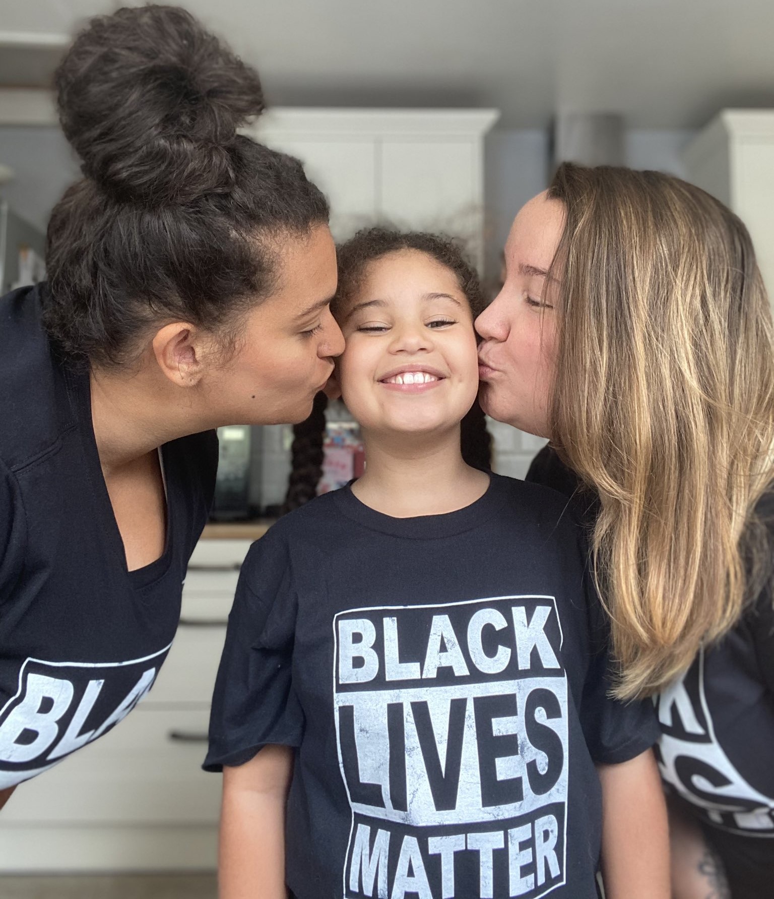 Poppy with her parents Jessica and Beki Lee-Burrowes.