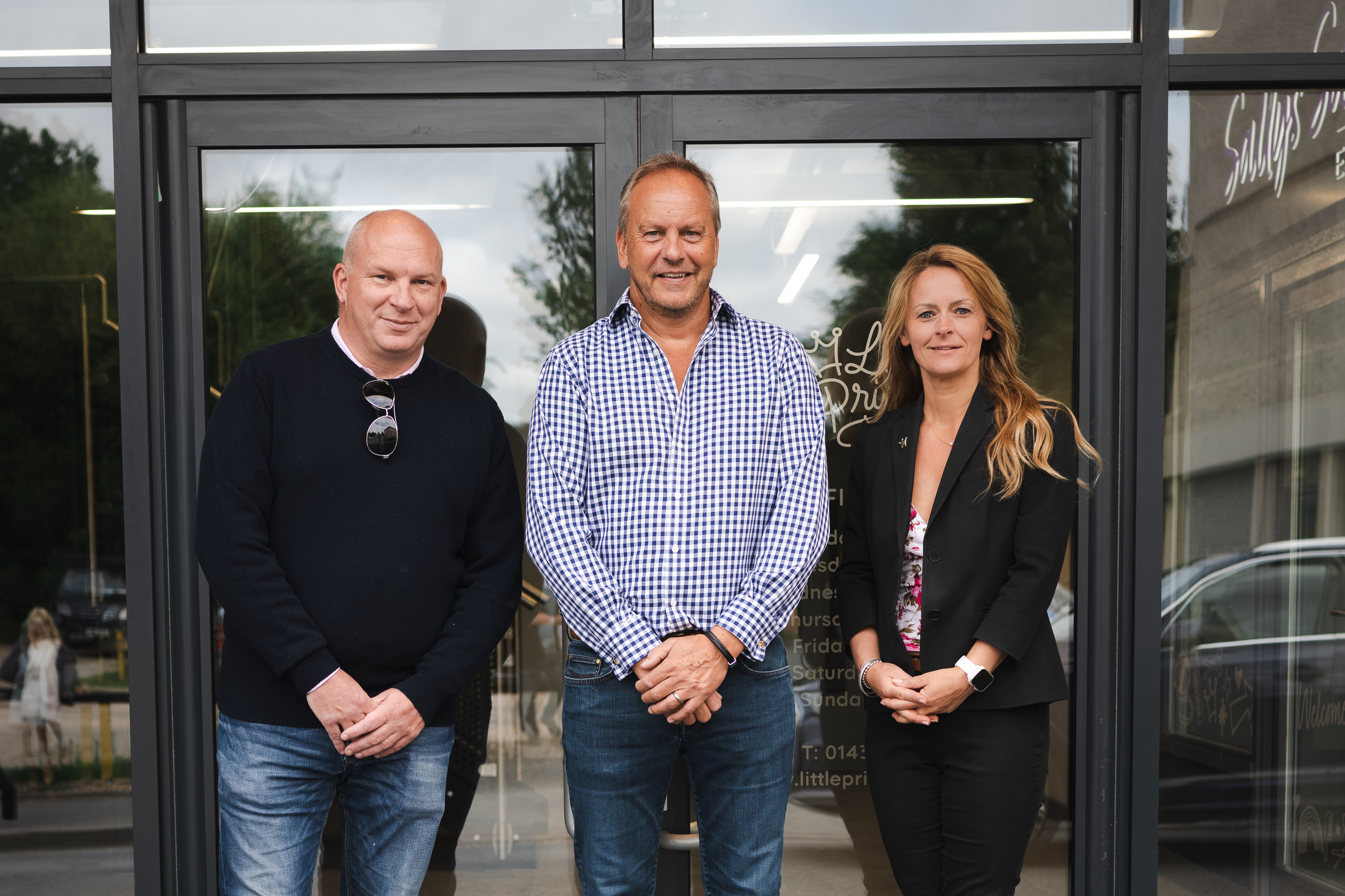 Outside the Hannah Tarplee Building are (l-r) Simon Tarplee, Phil Brace and Wendy Tarplee-Morris.