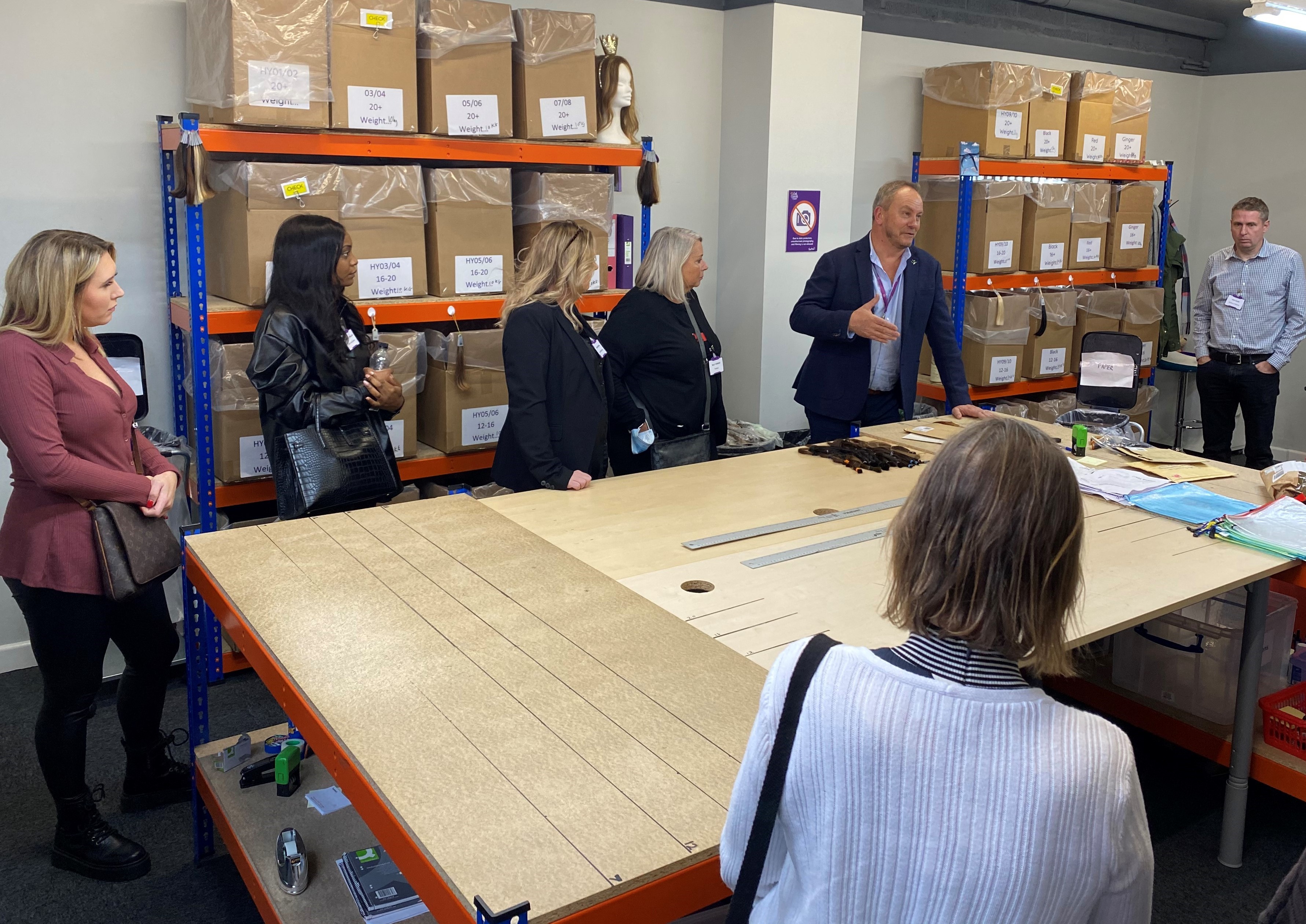 Wig industry experts were shown how and where our volunteers sort hair donations.