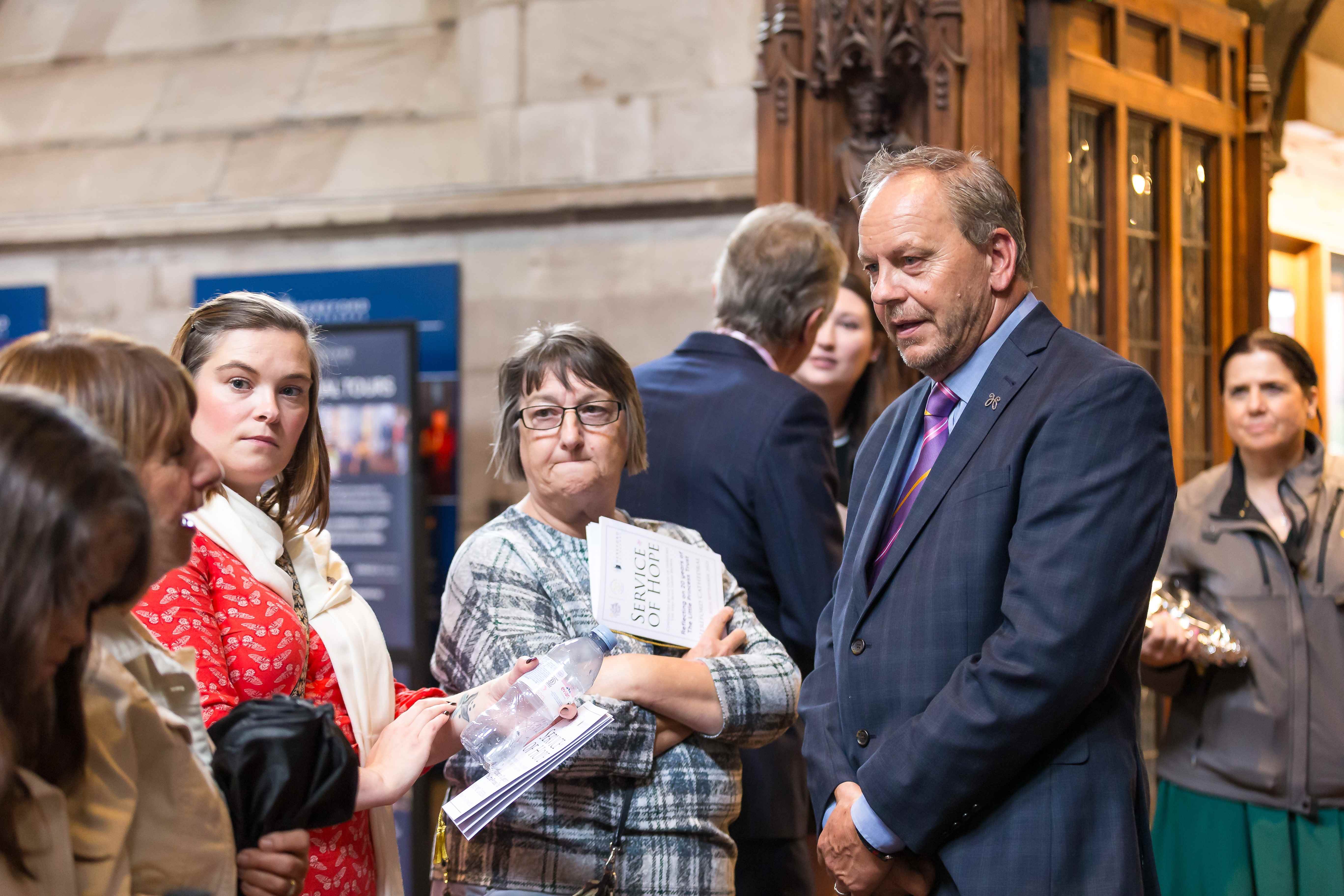 Phil Brace, Chief Executive of The Little Princess Trust, speaks to visitors at the Service of Hope. Photo: Gabriella Karney.