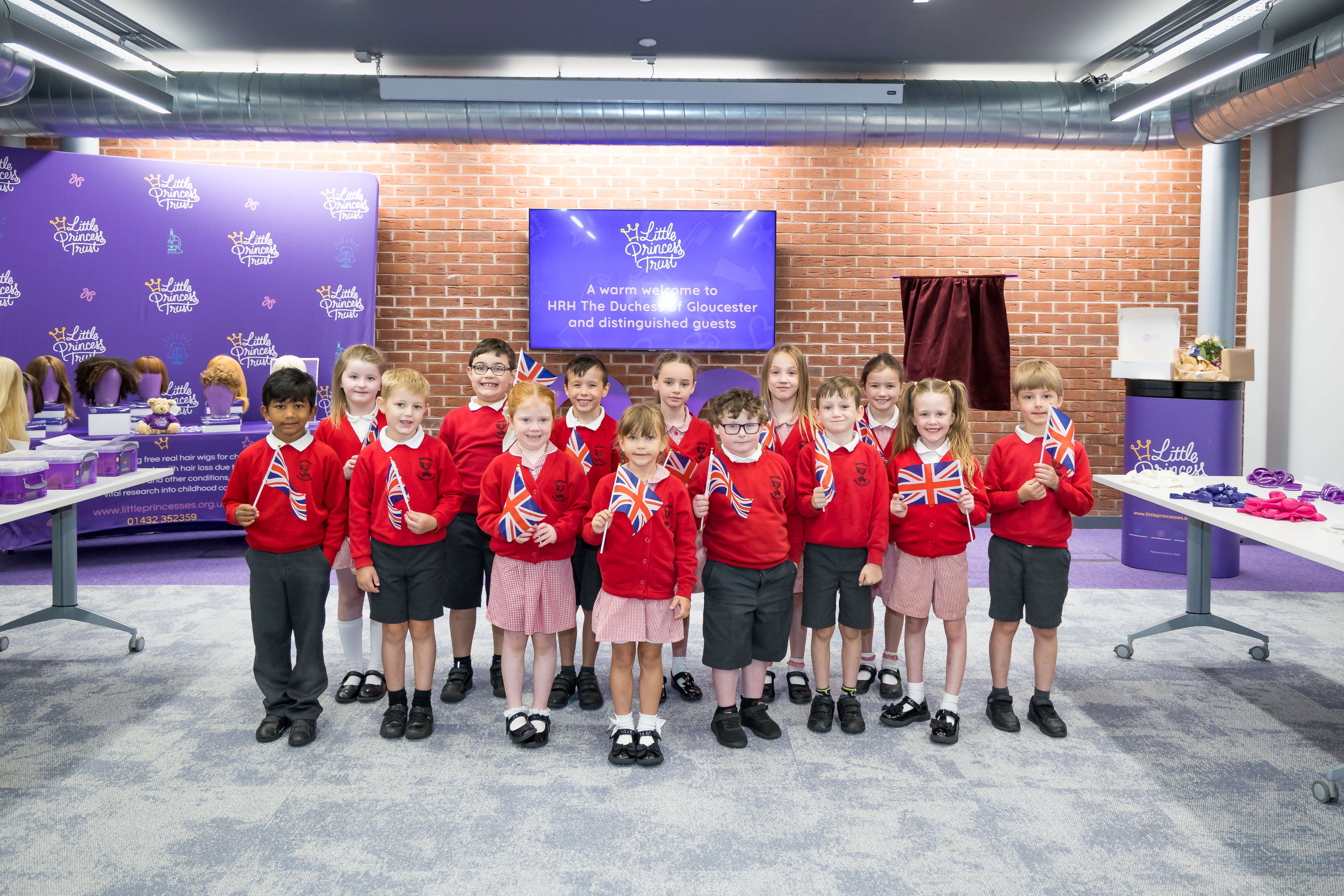 Children from Withington Primary School welcomed HRH to the Hannah Tarplee Building. Photo: Gabriella Karney.