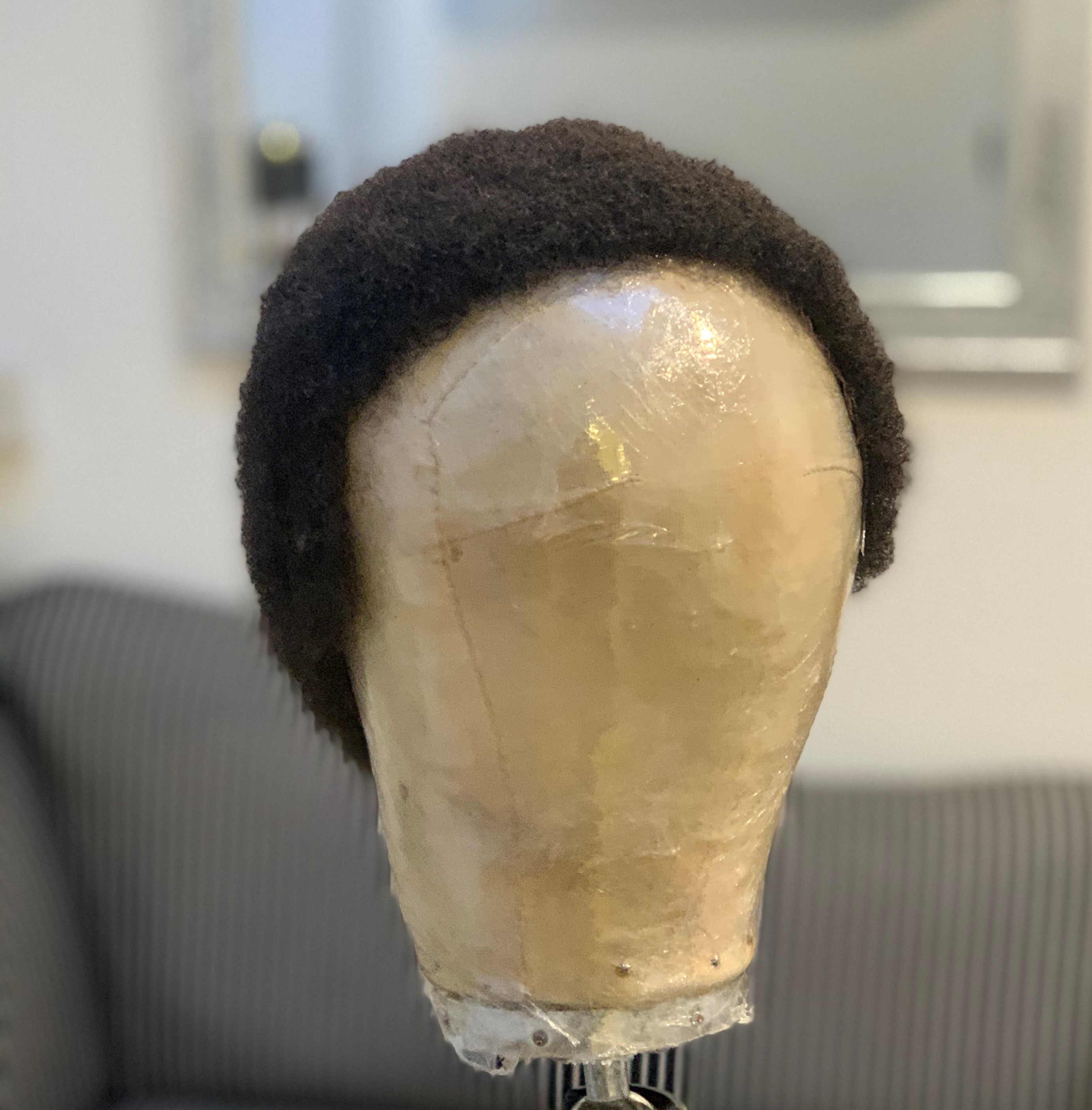 The second wig made for The Little Princess Trust which was made from Afro hair donations.