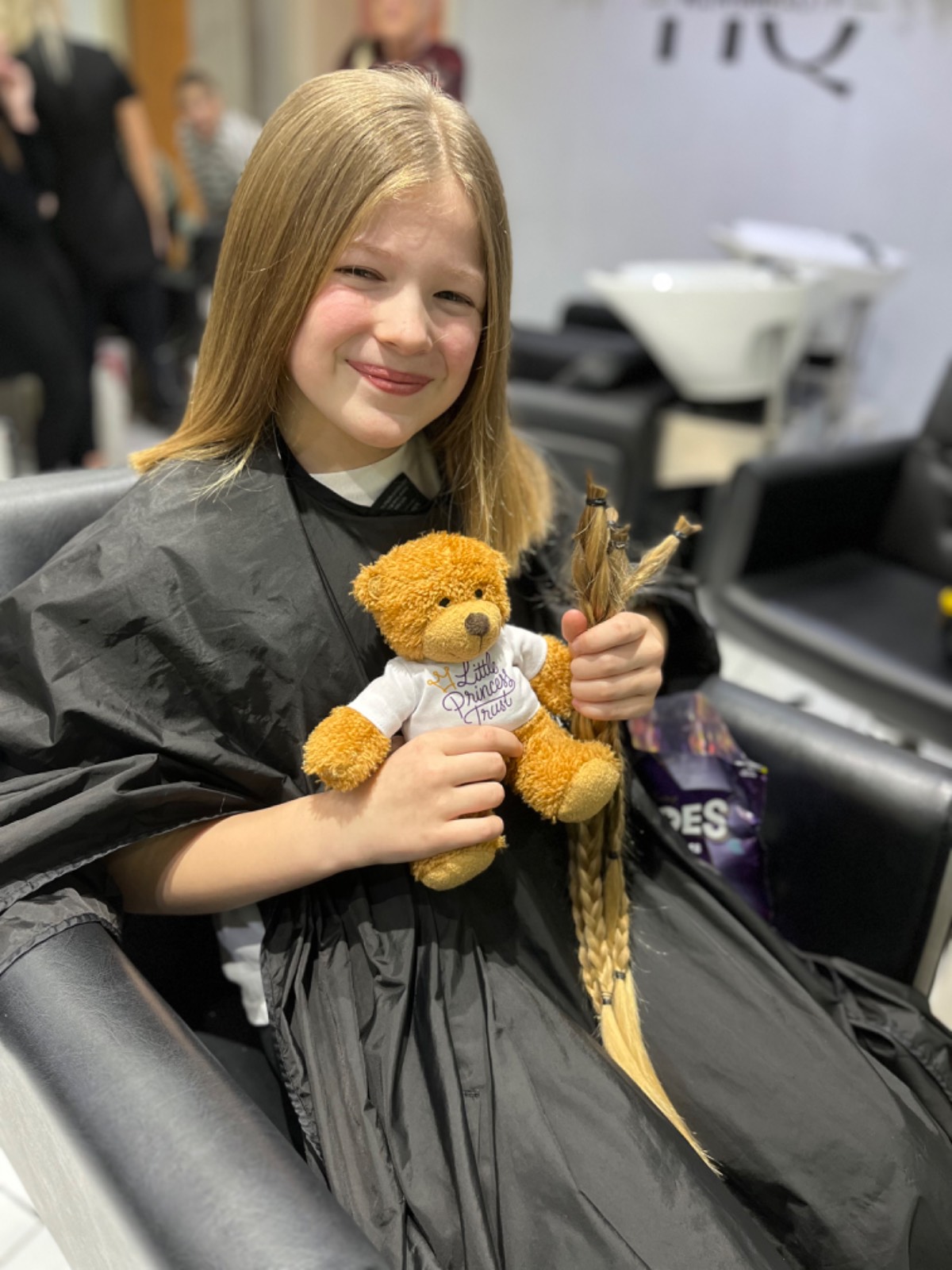 Millie donates 20 inches and raised over £1200